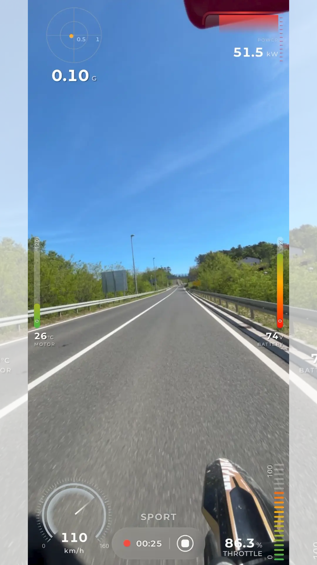 TORP App ride recording screen with live telemetry overlaid on road footage